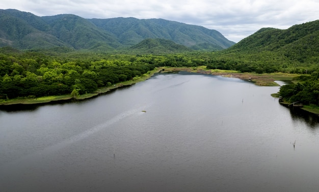 beautiful lake above the dam among blue sky clouds and mountains,lake mountain view