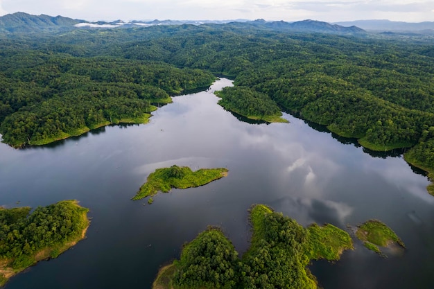 Beautiful lake above the dam among blue sky clouds and mountains,lake mountain view