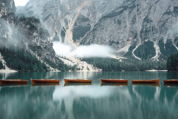 Beautiful lake with boats in the Italian alps, Lago di Braies