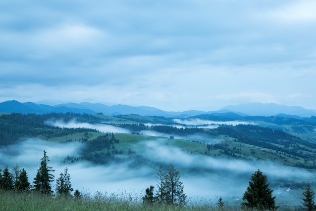 Beautiful landscape on mountain with clouds in the sky