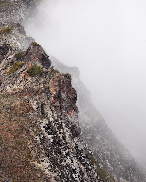 Beautiful landscape of mountains in the fog