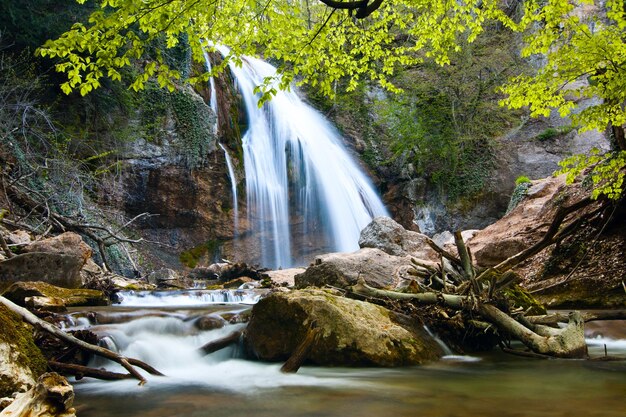 Beautiful landscape nature waterfall in the countryside in the rainforest view of the Crimean waterfall Pure and wonderful nature of Crimea Ukraine territory occupied by the Russian Federation