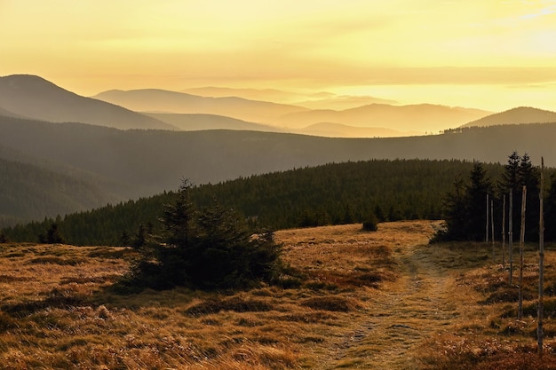 Beautiful landscape and sunset in the mountains Hills in clouds Jeseniky Czech Republic Europe