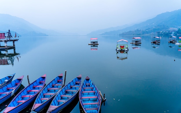 Beautiful landscape view of Phewa lake and boats at Pokhara Nepal