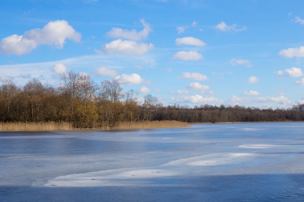 Beautiful landscape of a winter lake. Ice lake. The concept of appeasement and unity with nature