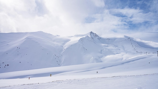 Beautiful landscape winter sunny day on snowy mountain in ski resort Arkhyz Caucasus mountains Russia