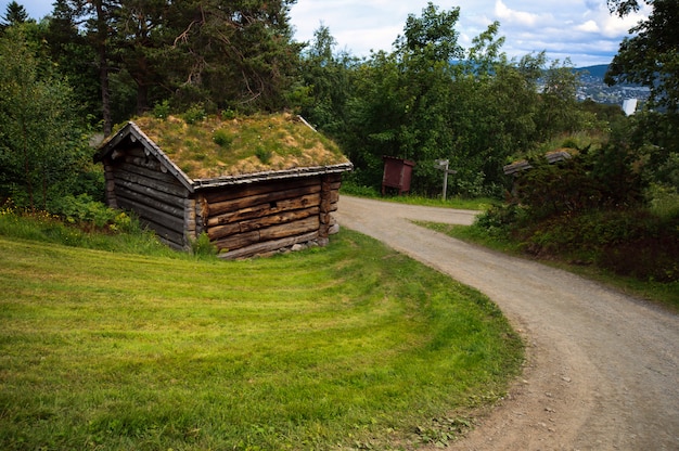 Beautiful landscape with ancient old historic house in Norway