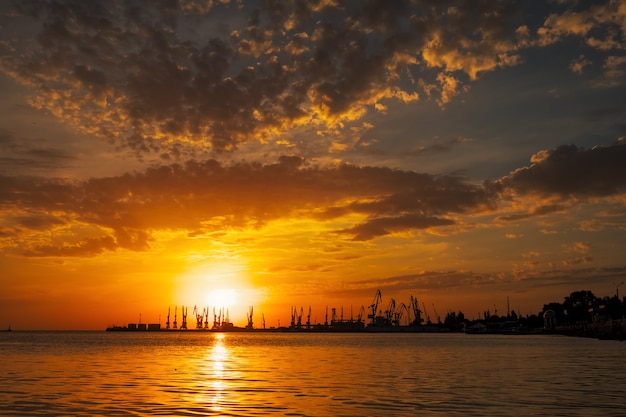 Beautiful landscape with fiery sunset sky and sea.  