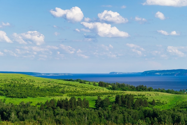 Beautiful landscape with hills, meadows and river