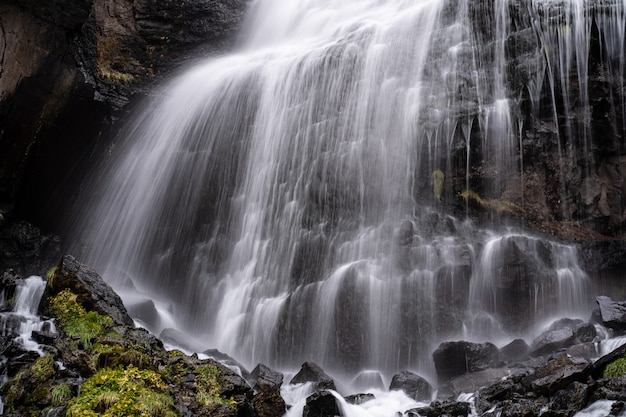 A beautiful landscape with mountain waterfall in Terskol. Elbrus area, Kabardino-Balkaria, Russian Federation