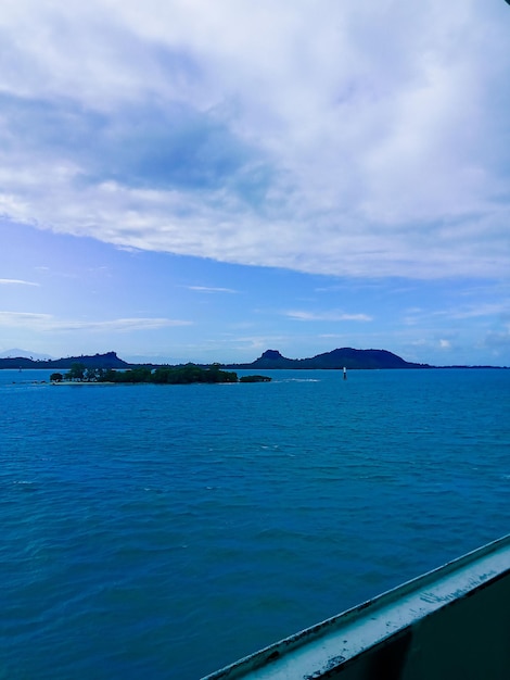 beautiful lanscape blue sea with passing boats