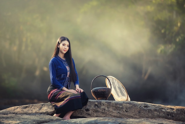 Beautiful Laos girl in Laos traditional costume, vintage style at Vientiane, Laos. 