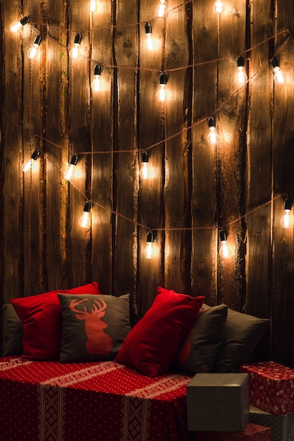 Beautiful light bulbs on a wooden wall