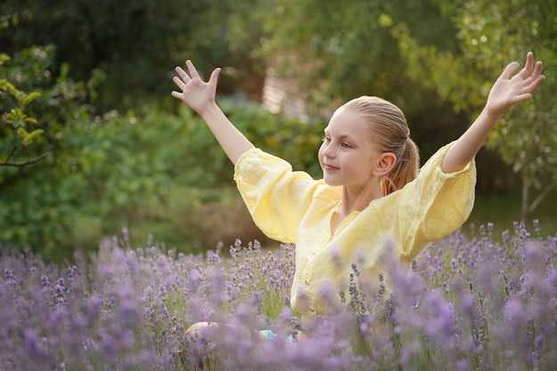 Beautiful little girl on lavender field