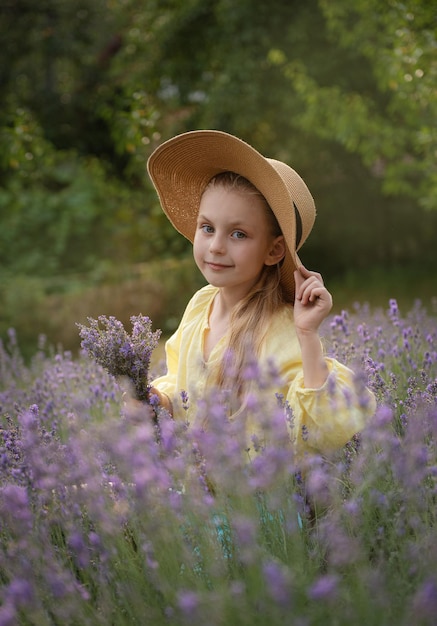 Beautiful little girl on lavender field