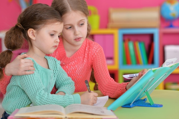 Beautiful little girls at class