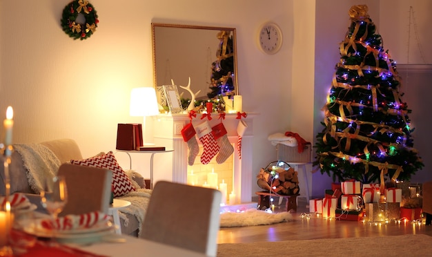 Beautiful living room with fireplace decorated for Christmas