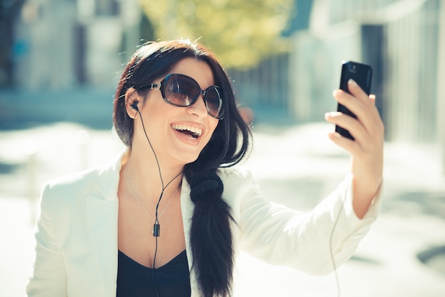 beautiful long black hair elegant business woman using smartphone