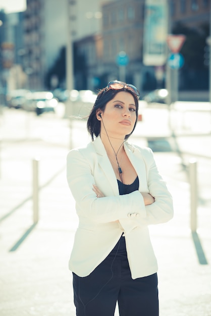 beautiful long black hair elegant business woman with earphones