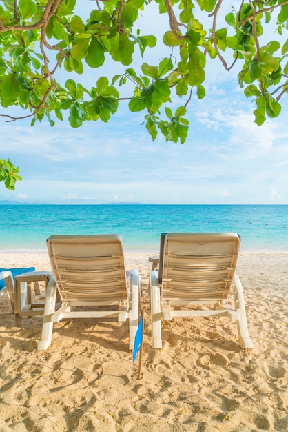 Beautiful luxury umbrella and chair on beach