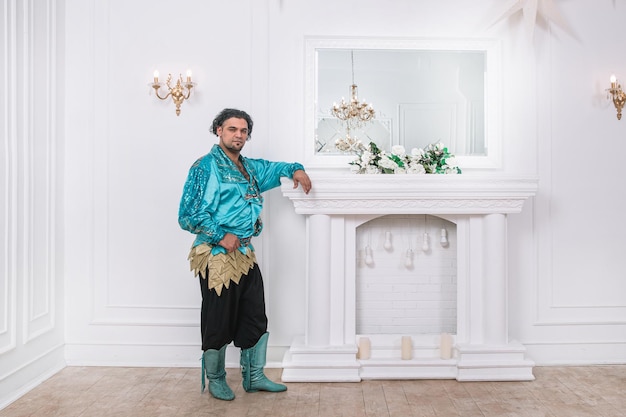 Beautiful male dancer in national Gypsy costume. photo with copy space