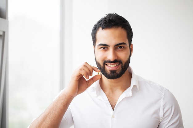 Beautiful Man Taking Pill Medicine