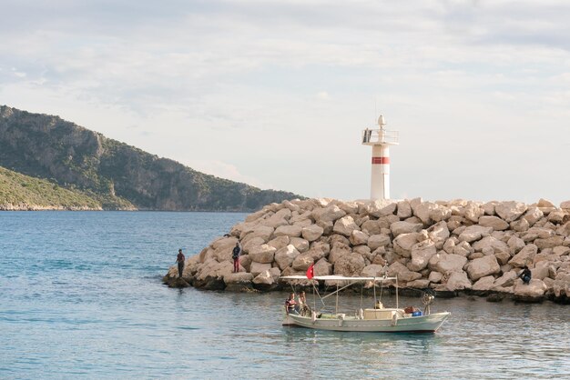 Beautiful mediterranean landscape Boat and lighthouse