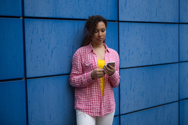 Beautiful mixed race African American teen girl woman young woman looking sad depressed