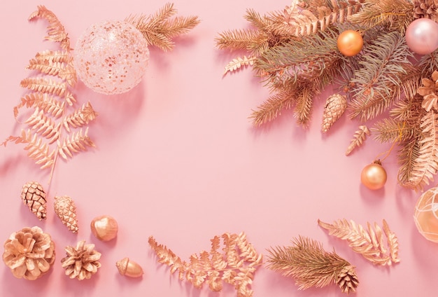 Beautiful modern Christmas background in gold and pink colors