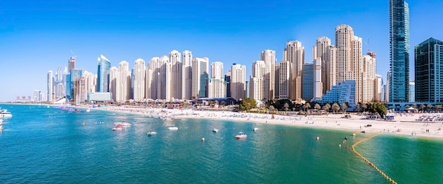 Beautiful modern residential buildings with beach in foreground