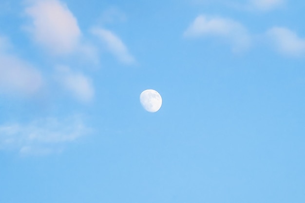 beautiful moon in a clear blue sky