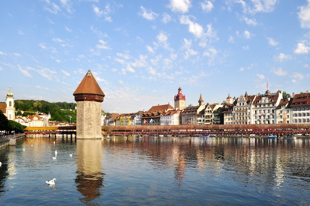 Beautiful morning at Lucerne Switzerland overlooking the iconic Chapel Bridge the wooden bridge