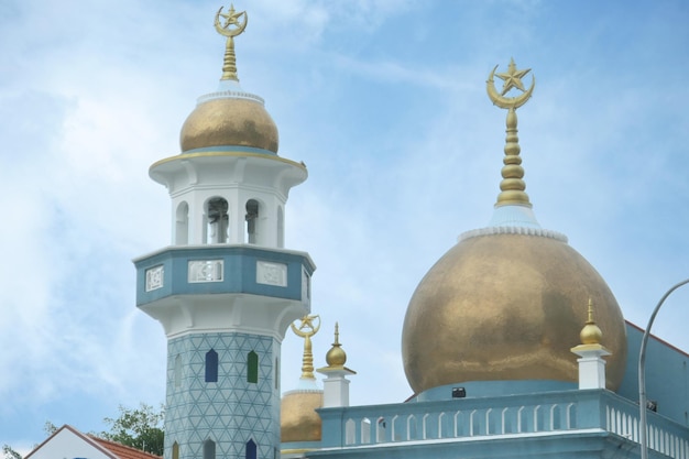 A beautiful mosque against blue sky