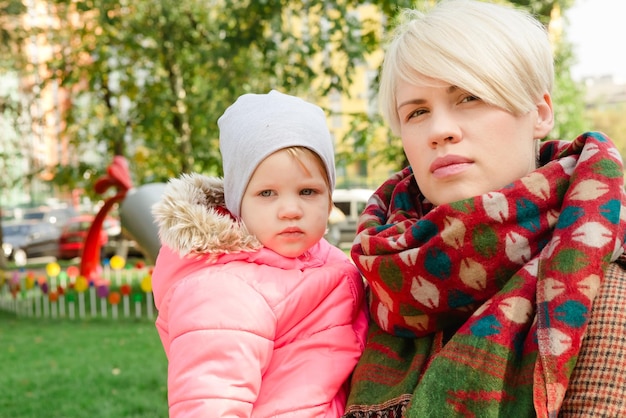 Beautiful Mother And Baby outdoors Nature Beauty Mum and her Child playing in Park together Outdoor Portrait of happy family Joy Mom and Baby