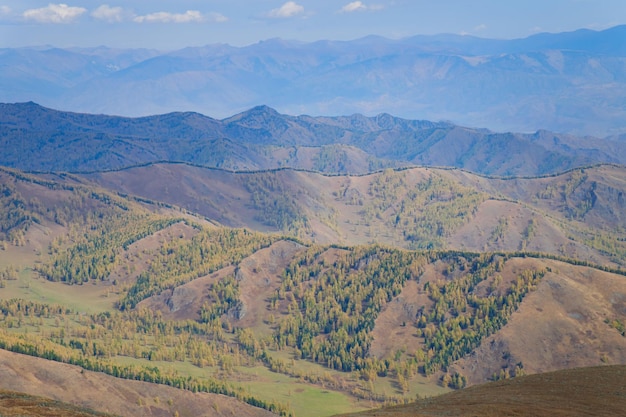 Beautiful mountain landscape Green foothills of Altai mountains Aerial view on mountain ranges