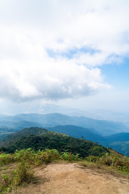 beautiful mountain layer with clouds and blue sky at  Kew Mae Pan Nature Trail in Chiang Mai, Thailand