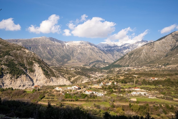 Beautiful mountain valley with gentle hills and clouds