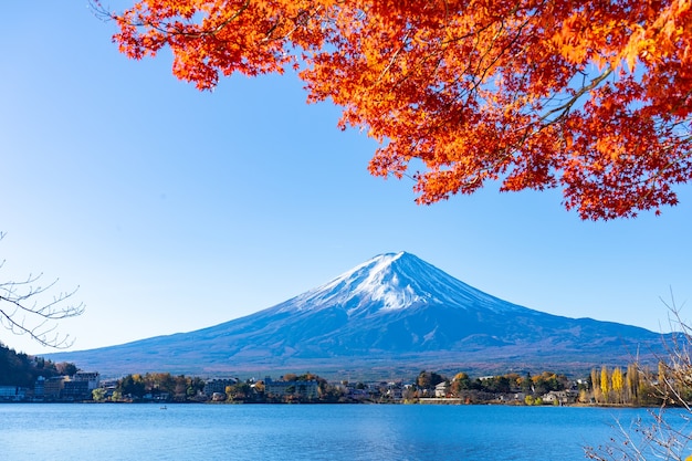 Beautiful Mt.Fuji with red maple leaf in autumn in Japan.