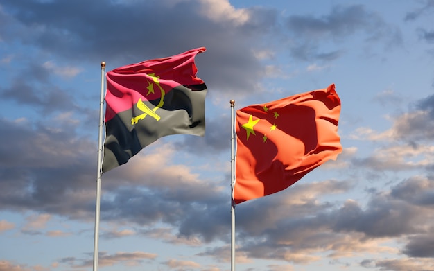 Beautiful national state flags of China and Angola together at the sky 