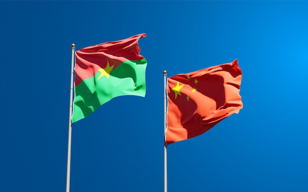 Beautiful national state flags of China and Burkina Faso together at the sky 