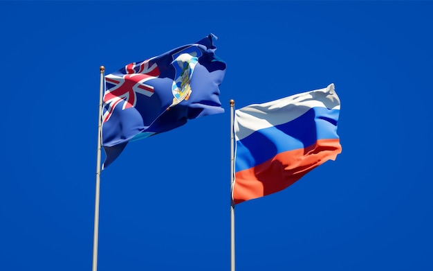 Beautiful national state flags of Falkland Islands and Russia together on blue sky. 3D artwork