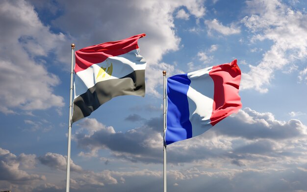 Beautiful national state flags of France and Egypt together at the sky 