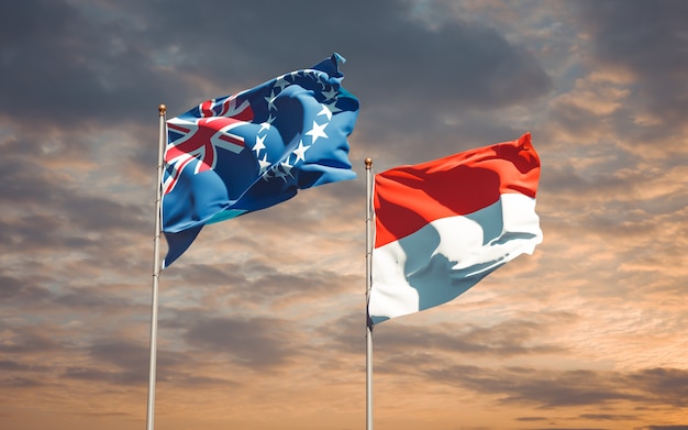 Beautiful national state flags of Indonesia and Cook Island together on blue sky