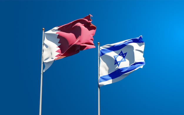 Beautiful national state flags of Israel and Qatar together at the sky background.