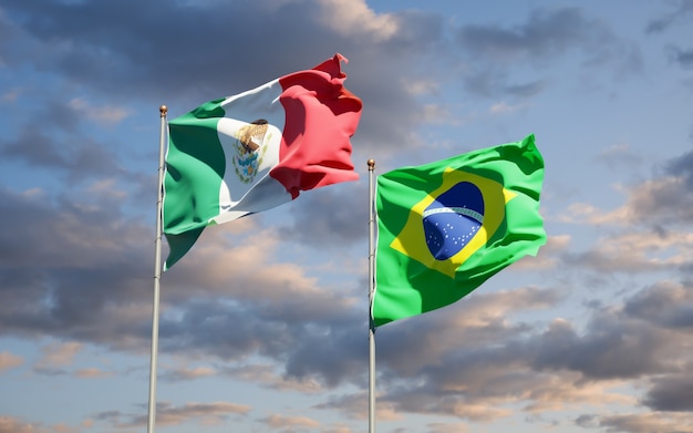 Beautiful national state flags of Mexico and Brasil together on blue sky