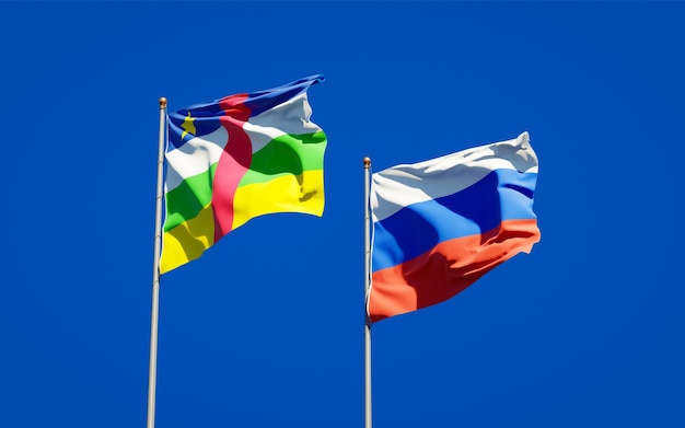 Beautiful national state flags of Russia and CAR Central African Republic together on blue sky. 3D artwork