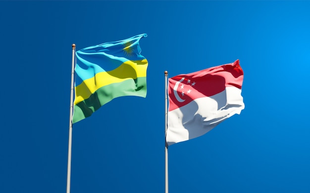 Beautiful national state flags of Rwanda and Singapore together