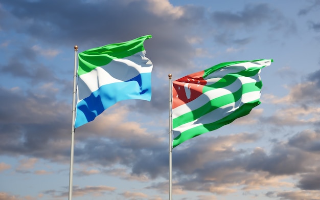 Beautiful national state flags of Sierra Leone and Abkhazia together