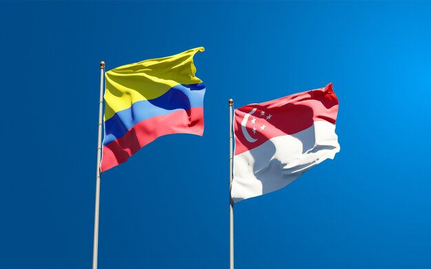 Beautiful national state flags of Singapore and Colombia