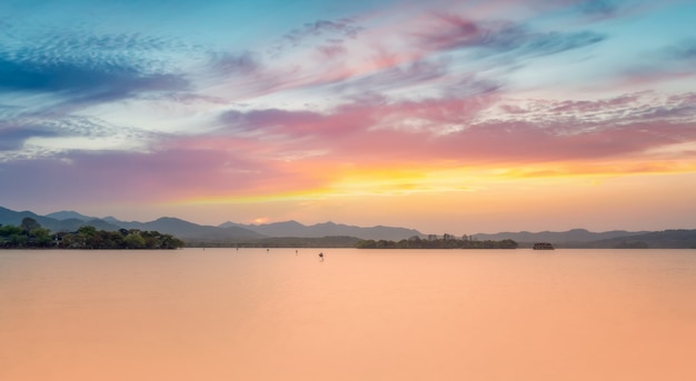 The beautiful natural scenery and wooden boats of West Lake in Hangzhou